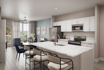 Gourmet kitchens with granite countertops & convenient islands